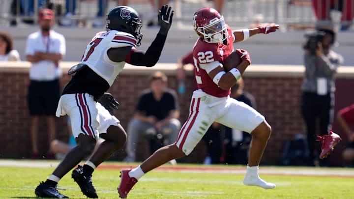 Oklahoma Sooners defensive back Peyton Bowen (22) loses his shoe as he is chased by DUPLICATE***South Carolina Gamecocks linebacker Demetrius Knight Jr. (17) during a college football game between the University of Oklahoma Sooners (OU) and the South Carolina Gamecocks at Gaylord Family - Oklahoma Memorial Stadium in Norman, Okla., Saturday, Oct. 19, 2024.