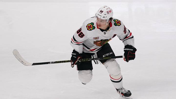 Apr 6, 2026; San Jose, California, USA;  Chicago Blackhawks center Connor Bedard (98) controls the puck against the San Jose Sharks in the third period at SAP Center at San Jose. Mandatory Credit: David Gonzales-Imagn Images