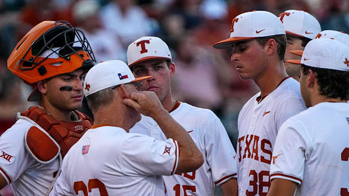 Texas Longhorns head coach David Pierce talks to pitcher Max Grubbs (38) on the mound during the game against Kansas at UFCU Disch–Falk Field on Friday, May. 17, 2024 in Austin.