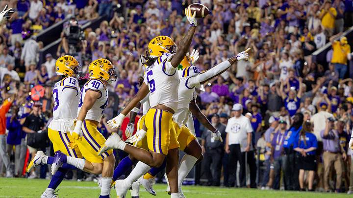 Oct 11, 2025; Baton Rouge, Louisiana, USA; LSU Tigers defensive end Patrick Payton (6) retrieves a fumbled ball by South Carolina Gamecocks quarterback Lanorris Sellers during the first half at Tiger Stadium. Mandatory Credit: Stephen Lew-Imagn Images Oct 11, 2025; Baton Rouge, Louisiana, USA; LSU Tigers defensive end Patrick Payton (6) retrieves a fumbled ball by South Carolina Gamecocks quarterback Lanorris Sellers during the first half at Tiger Stadium. Mandatory Credit: Stephen Lew-Imagn Images
