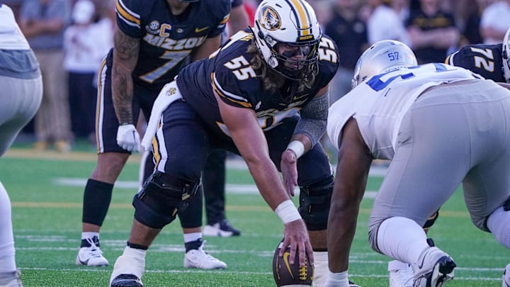 Sep 9, 2023; Columbia, Missouri, USA; Missouri Tigers offensive lineman Connor Tollison (55) lines up against the Middle Tennessee Blue Raiders during the game at Faurot Field at Memorial Stadium. Mandatory Credit: Denny Medley-Imagn Images Sep 9, 2023; Columbia, Missouri, USA; Missouri Tigers offensive lineman Connor Tollison (55) lines up against the Middle Tennessee Blue Raiders during the game at Faurot Field at Memorial Stadium. Mandatory Credit: Denny Medley-Imagn Images