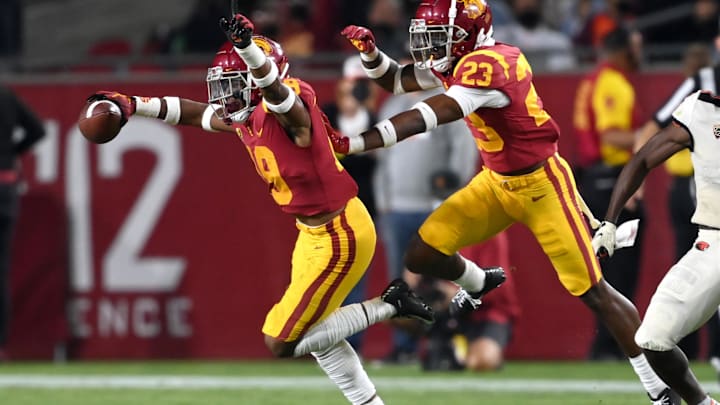 Sep 25, 2021; Los Angeles, California, USA; USC Trojans linebacker Raesjon Davis (9) celebrates after an interception in the second half of the game at United Airlines Field at Los Angeles Memorial Coliseum. Mandatory Credit: Jayne Kamin-Oncea-Imagn Images