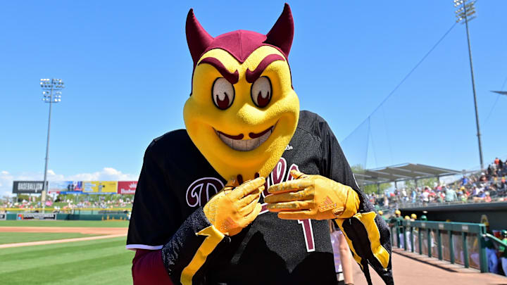 Mar 20, 2024; Mesa, Arizona, USA; Arizona State mascot Sparky performs prior to a spring training game between the Oakland Athletics and the Chicago Cubs at Hohokam Stadium. Mandatory Credit: Matt Kartozian-Imagn Images Mar 20, 2024; Mesa, Arizona, USA; Arizona State mascot Sparky performs prior to a spring training game between the Oakland Athletics and the Chicago Cubs at Hohokam Stadium. Mandatory Credit: Matt Kartozian-Imagn Images