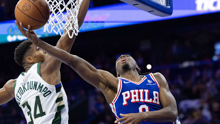Oct 23, 2024; Philadelphia, Pennsylvania, USA; Philadelphia 76ers guard Tyrese Maxey (0) drives for a shot against Milwaukee Bucks forward Giannis Antetokounmpo (34) during the fourth quarter at Wells Fargo Center. Mandatory Credit: Bill Streicher-Imagn Images