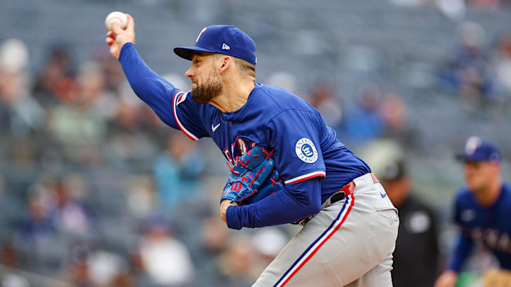 May 22, 2025; Bronx, New York, USA; Texas Rangers starting pitcher Nathan Eovaldi (17) delivers a pitch during the first inning against the New York Yankees at Yankee Stadium. 