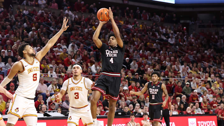 Feb 28, 2026; Ames, Iowa, USA; Texas Tech Red Raiders guard Christian Anderson (4) scores over Iowa State Cyclones forward Joshua Jefferson (5) during the second half at James H. Hilton Coliseum. Mandatory Credit: Reese Strickland-Imagn Images Feb 28, 2026; Ames, Iowa, USA; Texas Tech Red Raiders guard Christian Anderson (4) scores over Iowa State Cyclones forward Joshua Jefferson (5) during the second half at James H. Hilton Coliseum. Mandatory Credit: Reese Strickland-Imagn Images