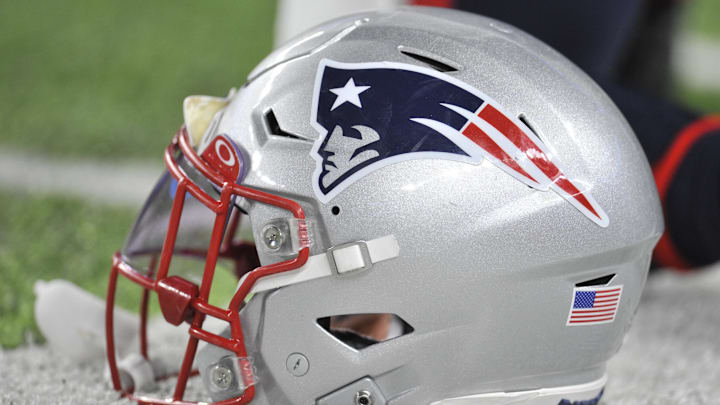 Nov 24, 2022; Minneapolis, Minnesota, USA; A New England Patriots helmet sits idle before the game between the Minnesota Vikings and the Patriots at U.S. Bank Stadium. Mandatory Credit: Jeffrey Becker-Imagn Images