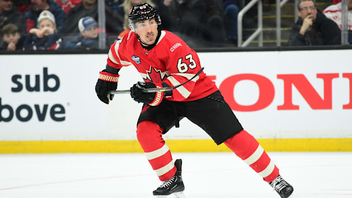 Feb 17, 2025; Boston, MA, USA; [Imagn Images direct customers only]  Team Canada forward Brad Marchand (63) skates during the first period in a 4 Nations Face-Off ice hockey game against Team Finland at TD Garden. Mandatory Credit: Bob DeChiara-Imagn Images