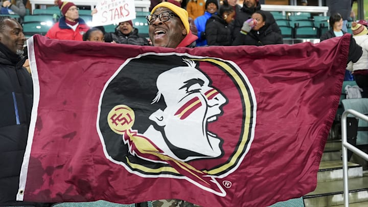 Dec 5, 2025; Kansas City, MO, USA; A Florida State Seminoles fan cheers after defeating the Texas Christian University Horned Frogs in a 2025 NCAA Women’s College Cup semifinal match at CPKC Stadium. Mandatory Credit: Jay Biggerstaff-Imagn Images