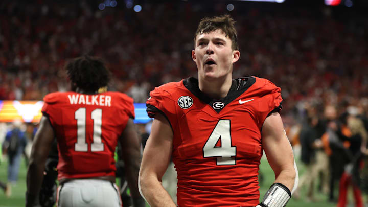 Dec 7, 2024; Atlanta, GA, USA; Georgia Bulldogs tight end Oscar Delp (4) reacts after defeating the Texas Longhorns in overtime in the 2024 SEC Championship game at Mercedes-Benz Stadium. Mandatory Credit: Brett Davis-Imagn Images Dec 7, 2024; Atlanta, GA, USA; Georgia Bulldogs tight end Oscar Delp (4) reacts after defeating the Texas Longhorns in overtime in the 2024 SEC Championship game at Mercedes-Benz Stadium. Mandatory Credit: Brett Davis-Imagn Images