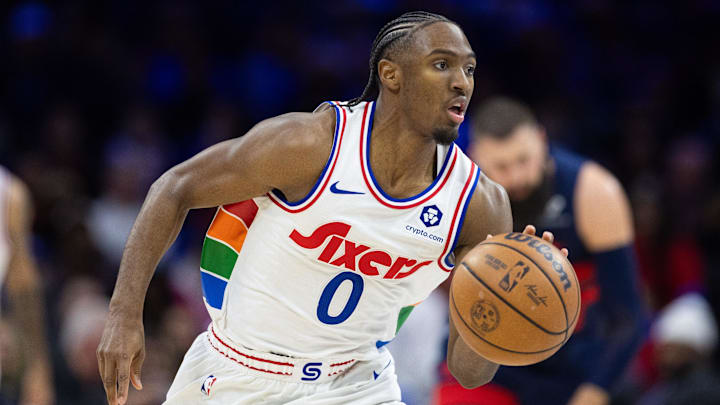 Jan 8, 2025; Philadelphia, Pennsylvania, USA; Philadelphia 76ers guard Tyrese Maxey (0) dribbles the ball against the Washington Wizards during the third quarter at Wells Fargo Center. Mandatory Credit: Bill Streicher-Imagn Images