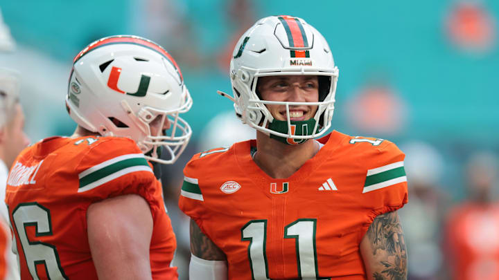 Sep 6, 2025; Miami Gardens, Florida, USA; Miami Hurricanes quarterback Carson Beck (11) reacts on the field before the game against the Bethune-Cookman Wildcats at Hard Rock Stadium. Mandatory Credit: Sam Navarro-Imagn Images