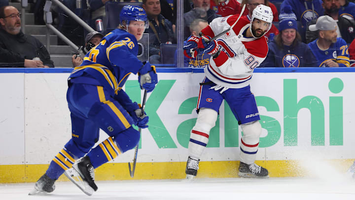 May 14, 2026; Buffalo, New York, USA; Buffalo Sabres defenseman Rasmus Dahlin (26) watches as Montréal Canadiens center Joe Veleno (90) takes a shot on goal during the first period in game five of the second round of the 2026 Stanley Cup Playoffs at KeyBank Center. Mandatory Credit: Timothy T. Ludwig-Imagn Images