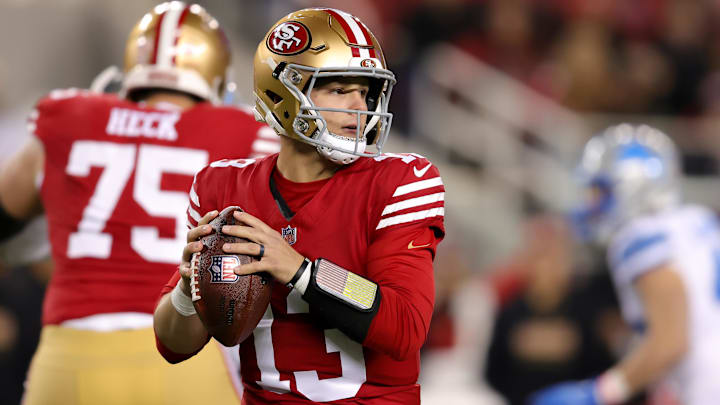 Dec 30, 2024; Santa Clara, California, USA; San Francisco 49ers quarterback Brock Purdy (13) drops back to pass during the first quarter against the Detroit Lions at Levi's Stadium. Mandatory Credit: Sergio Estrada-Imagn Images