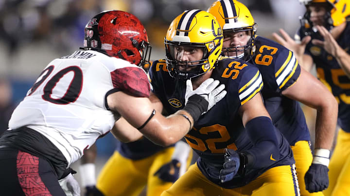 Nick Morrow (52) started 11 games last season as a redshirt freshman tackle