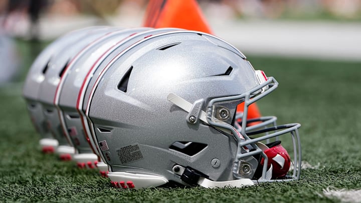 Sep 2, 2023; Bloomington, Indiana, USA; Ohio State Buckeyes helmets sit on the sideline prior to the NCAA football game at Indiana University Memorial Stadium. Ohio State won 23-3.