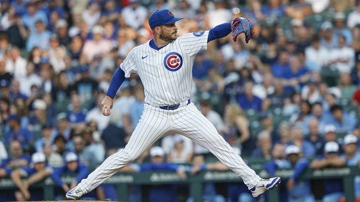 Ryan Brasier of Chicago Cubs throws pitch from right han