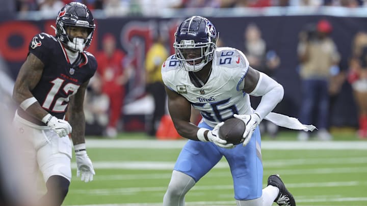 Nov 24, 2024; Houston, Texas, USA; Tennessee Titans linebacker Kenneth Murray Jr. (56) intercepts a pass during the third quarter against the Houston Texans at NRG Stadium. Mandatory Credit: Troy Taormina-Imagn Images