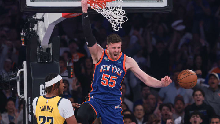 May 14, 2024; New York, New York, USA; New York Knicks center Isaiah Hartenstein (55) reacts after dunking the ball against Indiana Pacers center Myles Turner (33) during game five of the second round for the 2024 NBA playoffs at Madison Square Garden. Mandatory Credit: Vincent Carchietta-USA TODAY Sports