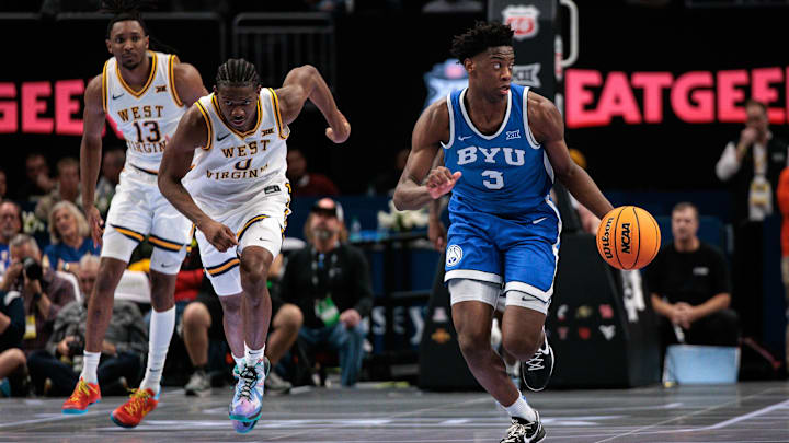 Mar 11, 2026; Kansas City, MO, USA; BYU Cougars forward AJ Dybantsa (3) brings the ball up court ahead of West Virginia Mountaineers forward Brenen Lorient (0) during the second half at T-Mobile Center. Mandatory Credit: William Purnell-Imagn Images Mar 11, 2026; Kansas City, MO, USA; BYU Cougars forward AJ Dybantsa (3) brings the ball up court ahead of West Virginia Mountaineers forward Brenen Lorient (0) during the second half at T-Mobile Center. Mandatory Credit: William Purnell-Imagn Images