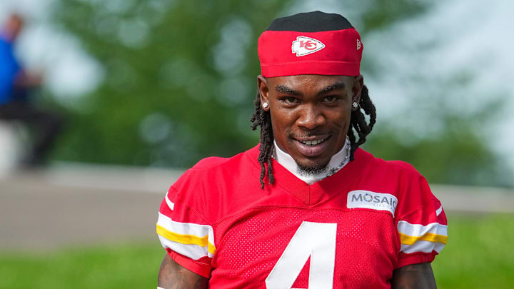 Jul 22, 2025; St. Joseph, MO, USA; Kansas City Chiefs wide receiver Rashee Rice (4) walks down the hill to the fields prior to training camp at Missouri Western State University. Mandatory Credit: Denny Medley-Imagn Images