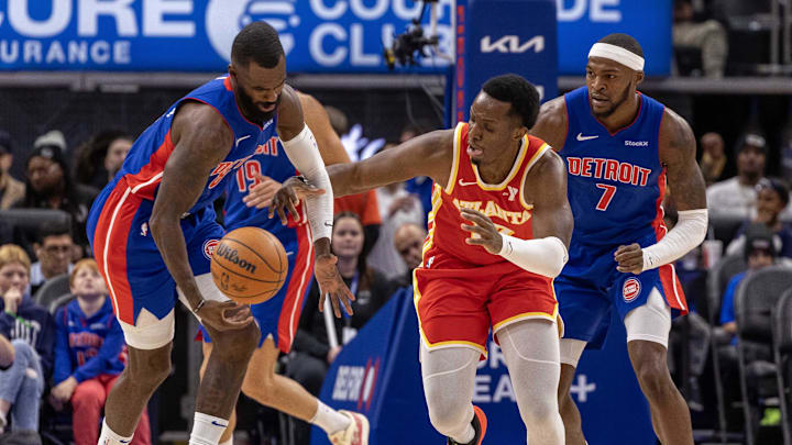 Nov 8, 2024; Detroit, Michigan, USA; Detroit Pistons forward Tim Hardaway Jr. (8) blocks a pass to Atlanta Hawks forward Onyeka Okongwu (17) during the second half at Little Caesars Arena. Mandatory Credit: David Reginek-Imagn Images Nov 8, 2024; Detroit, Michigan, USA; Detroit Pistons forward Tim Hardaway Jr. (8) blocks a pass to Atlanta Hawks forward Onyeka Okongwu (17) during the second half at Little Caesars Arena. Mandatory Credit: David Reginek-Imagn Images