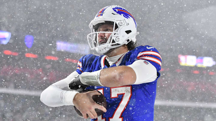 Dec 1, 2024; Orchard Park, New York, USA; Buffalo Bills quarterback Josh Allen (17) reacts to scoring a rushing touchdown against the San Francisco 49ers in the third quarter at Highmark Stadium.