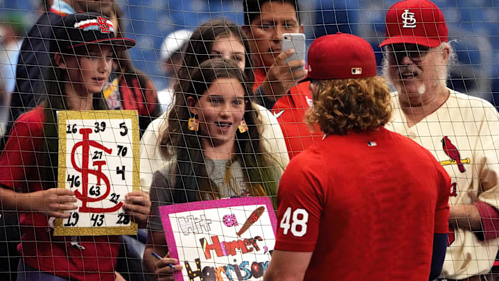 Jun 8, 2022; St. Petersburg, Florida, USA; St. Louis Cardinals fans Mallory Taylor (left, age 10) sister Josephine Taylor (middle, age 10), and Bill Goldschmitt (right) get autographs from St. Louis Cardinals center fielder Harrison Bader (48) before the Tampa Bay Rays play the St. Louis Cardinals at Tropicana Field. Mandatory Credit: Dave Nelson-Imagn Images Jun 8, 2022; St. Petersburg, Florida, USA; St. Louis Cardinals fans Mallory Taylor (left, age 10) sister Josephine Taylor (middle, age 10), and Bill Goldschmitt (right) get autographs from St. Louis Cardinals center fielder Harrison Bader (48) before the Tampa Bay Rays play the St. Louis Cardinals at Tropicana Field. Mandatory Credit: Dave Nelson-Imagn Images