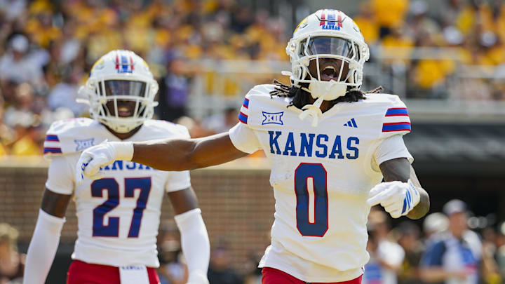 Sep 6, 2025; Columbia, Missouri, USA; Kansas Jayhawks defensive back Austin Alexander (0) celebrates during the first half against the Missouri Tigers at Faurot Field at Memorial Stadium. Mandatory Credit: Jay Biggerstaff-Imagn Images