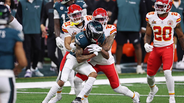 Feb 9, 2025; New Orleans, LA, USA; Philadelphia Eagles wide receiver DeVonta Smith (6) makes a catch against Kansas City Chiefs cornerback Trent McDuffie (22) during the first half of Super Bowl LIX at Caesars Superdome. Mandatory Credit: Bill Streicher-Imagn Images