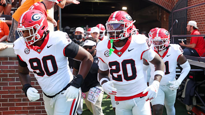 Sep 13, 2025; Knoxville, Tennessee, USA; The Georgia Bulldogs enter the field before the game against the Tennessee Volunteers at Neyland Stadium. Mandatory Credit: Alan Poizner-Imagn Images