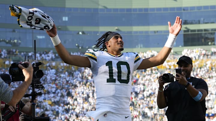 Oct 20, 2024; Green Bay, Wisconsin, USA;  Green Bay Packers quarterback Jordan Love (10) celebrates as he runs off the field following the game against the Houston Texans at Lambeau Field. Mandatory Credit: Jeff Hanisch-Imagn Images