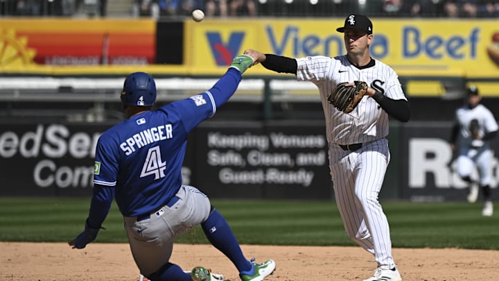 Chicago White Sox shortstop Tanner Murphy completes a double play against the Toronto Blue Jays.