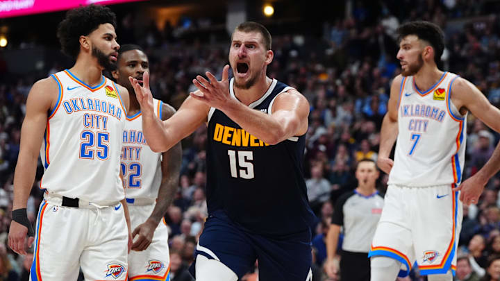 Nov 6, 2024; Denver, Colorado, USA; Denver Nuggets center Nikola Jokic (15) calls out in the second half against the Oklahoma City Thunder at Ball Arena. Mandatory Credit: Ron Chenoy-Imagn Images