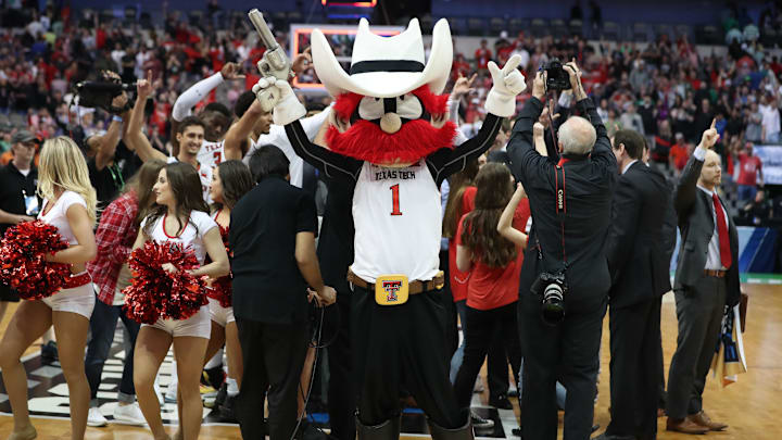Mar 17, 2018; Dallas, TX, USA; Texas Tech Red Raiders mascot celebrates a victory against the Florida Gators in the second round of the 2018 NCAA Tournament at American Airlines Center. Mandatory Credit: Kevin Jairaj-USA TODAY Sports