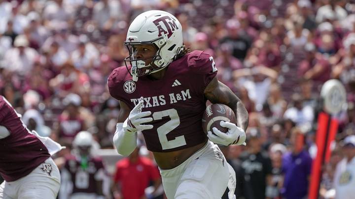 Texas A&M Aggies wide receiver Terry Bussey (2) runs with the football during the second half against the Utah State Aggies at Kyle Field. Texas A&M Aggies wide receiver Terry Bussey (2) runs with the football during the second half against the Utah State Aggies at Kyle Field.
