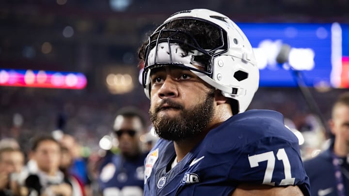 Penn State Nittany Lions offensive lineman Olaivavega Ioane (71) 