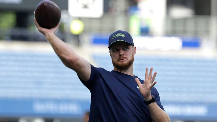 Seattle Seahawks quarterback Sam Darnold (14) warms up before the game against the New England Patriots at Lumen Field. Seattle Seahawks quarterback Sam Darnold (14) warms up before the game against the New England Patriots at Lumen Field.