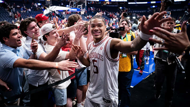 Arkansas guard Darius Acuff Jr. (5) celebrates after defeating Mississippi in overtime during a SEC tournament semifinal game at Bridgestone Arena in Nashville, Tenn., Saturday, March 14, 2026. Arkansas guard Darius Acuff Jr. (5) celebrates after defeating Mississippi in overtime during a SEC tournament semifinal game at Bridgestone Arena in Nashville, Tenn., Saturday, March 14, 2026.