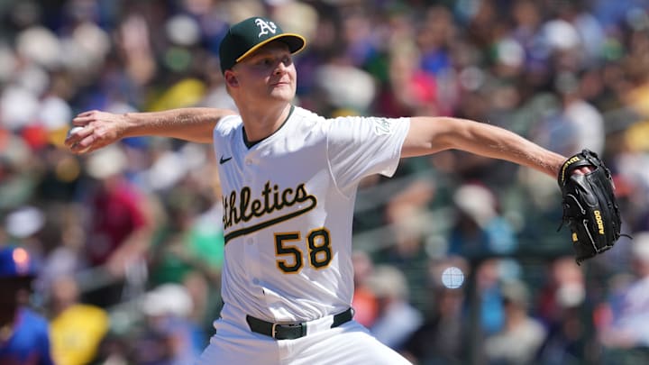 Apr 13, 2025; West Sacramento, California, USA; Athletics pitcher Noah Murdock (58) throws a pitch against the New York Mets during the seventh inning at Sutter Health Park. Mandatory Credit: Darren Yamashita-Imagn Images