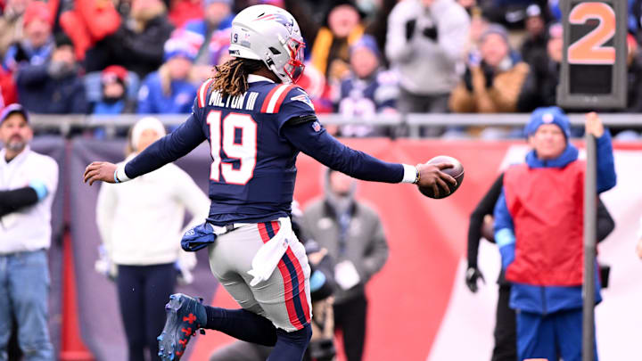 Jan 5, 2025; Foxborough, Massachusetts, USA; New England Patriots quarterback Joe Milton III (19) runs for a touchdown against the Buffalo Bills during the first half at Gillette Stadium. Mandatory Credit: Brian Fluharty-Imagn Images Jan 5, 2025; Foxborough, Massachusetts, USA; New England Patriots quarterback Joe Milton III (19) runs for a touchdown against the Buffalo Bills during the first half at Gillette Stadium. Mandatory Credit: Brian Fluharty-Imagn Images