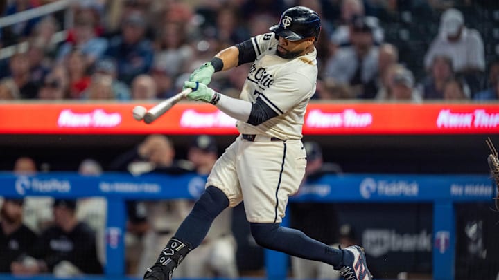 Minnesota Twins first base Carlos Santana hits during a game against the Miami Marlins on Sept. 26 at Target Field.
