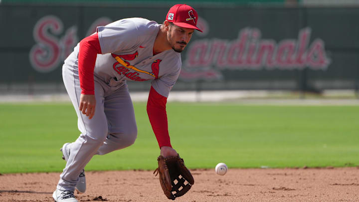 Feb 17, 2025; Jupiter, FL, USA;  St. Louis Cardinals third base Nolan Arenado (28) takes infield practice at spring training. Mandatory Credit: Jim Rassol-Imagn Images