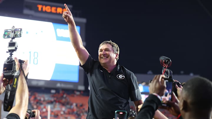 Oct 11, 2025; Auburn, Alabama, USA;  Georgia Bulldogs head coach Kirby Smart celebrates after the Bulldogs beat the Auburn Tigers at Jordan-Hare Stadium. Mandatory Credit: John Reed-Imagn Images