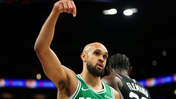Feb 24, 2026; Phoenix, Arizona, USA; Boston Celtics guard Derrick White celebrates against the Phoenix Suns in the second half at Mortgage Matchup Center. Mandatory Credit: Mark J. Rebilas-Imagn Images