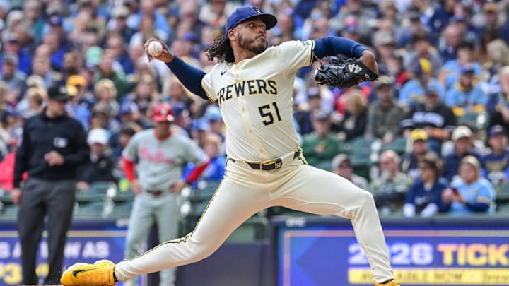 Sep 4, 2025; Milwaukee, Wisconsin, USA; Milwaukee Brewers starting pitcher Freddy Peralta (51) throws against the Philadelphia Phillies in the first inning at American Family Field. Mandatory Credit: Benny Sieu-Imagn Images