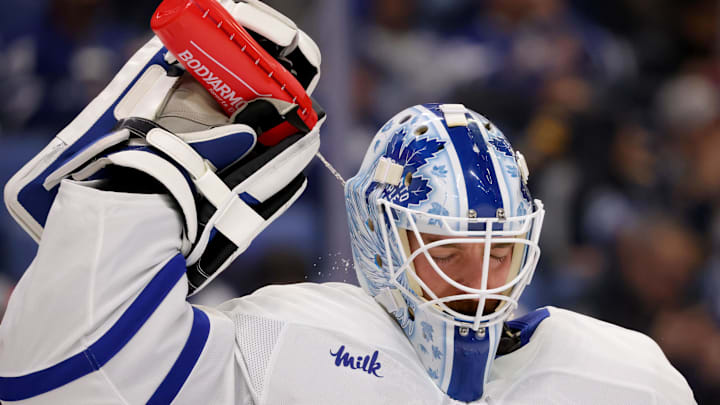Dec 20, 2024; Buffalo, New York, USA;  Toronto Maple Leafs goaltender Matt Murray (30) sprays himself with water during a stoppage in play against the Buffalo Sabres at KeyBank Center. Mandatory Credit: Timothy T. Ludwig-Imagn Images