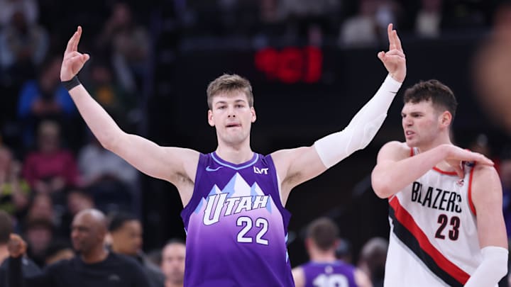 Feb 24, 2025; Salt Lake City, Utah, USA; Utah Jazz forward Kyle Filipowski (22) and Portland Trail Blazers center Donovan Clingan (23) reacts to a play during the second half at Delta Center. Mandatory Credit: Rob Gray-Imagn Images Feb 24, 2025; Salt Lake City, Utah, USA; Utah Jazz forward Kyle Filipowski (22) and Portland Trail Blazers center Donovan Clingan (23) reacts to a play during the second half at Delta Center. Mandatory Credit: Rob Gray-Imagn Images