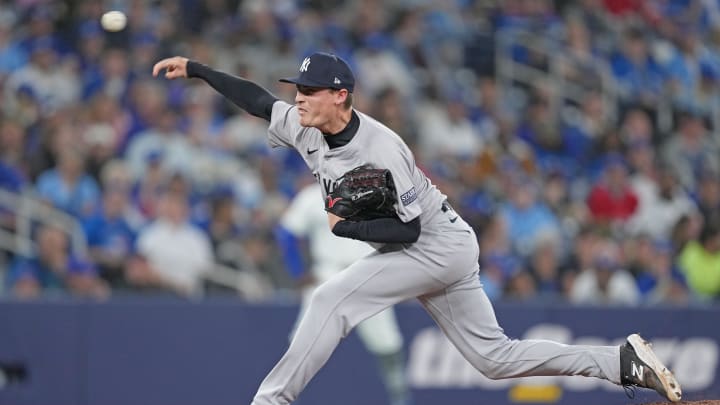 Apr 15, 2024; Toronto, Ontario, CAN; New York Yankees relief pitcher Ron Marinaccio wearing number Apr 15, 2024; Toronto, Ontario, CAN; New York Yankees relief pitcher Ron Marinaccio wearing number