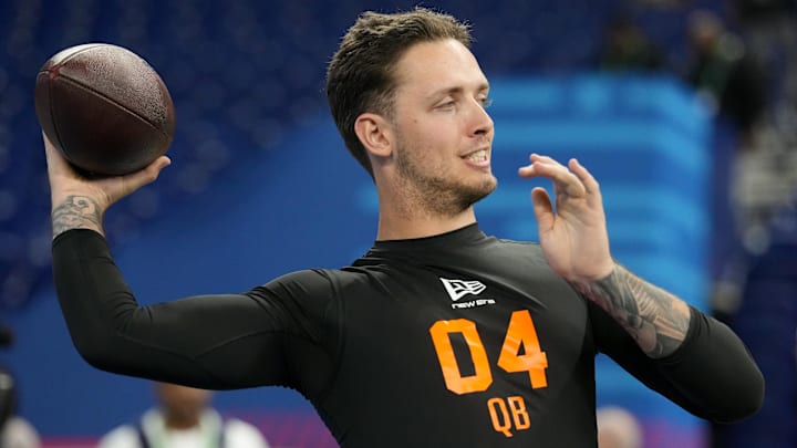 Feb 28, 2026; Indianapolis, IN, USA; Miami quarterback Carson Beck (QB04) during the NFL Scouting Combine at Lucas Oil Stadium. 